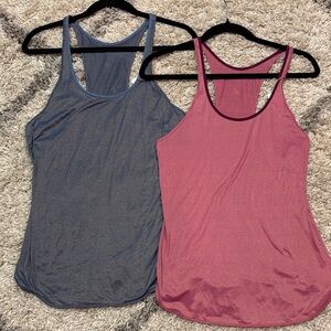 16. Bundle of 2- lululemon gold shimmery blue & reddish razor back tanks -size 8